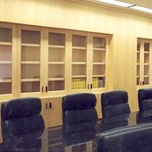 Conference Room with bookcases, cabinets and panelling, granite conference table