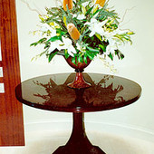 Entrance Hall Table, freestanding: stained ribbon stripe mahogany with hand rubb