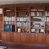 Bookcase/Storage Cabinet, built-in: stained knotty pine.