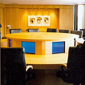 Conference Table, freestanding: natural white ash with hydraulically lifted turr