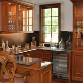 Bar with Display Cabinets, built-in: granite, glass, stained maple.