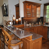 Bar, built-in: granite, stained and glazed maple.