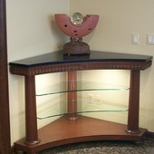 Display table:  Granite, glass, stained mahogany.