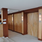 Dressing Room with closets and entryway doors, built-in: glass, natural anigre a