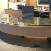 Executive Desk, freestanding: granite, natural birdseye maple.