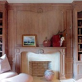 Paneled Room, built-in: pickled oak with hand carved cartouches.