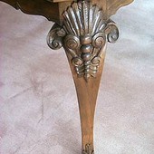 Game Table (detail), freestanding: stained and glazed white oak with hand carved