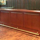 Bar, built-in: brass, stained mahogany.