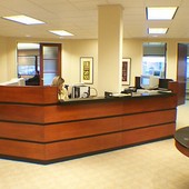 Reception Desk, built-in: granite, stained maple with black lacquer accents.