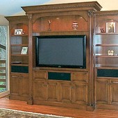 Entertainment Center, freestanding: stained and glazed maple.