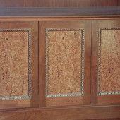 Walnut frame with sliver leafed effect accent moldings and natural olive ash bur